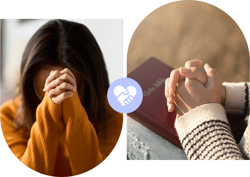 Two people praying, hands clasped over Bible
